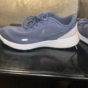 Nike Revolution size 8.5 in purple